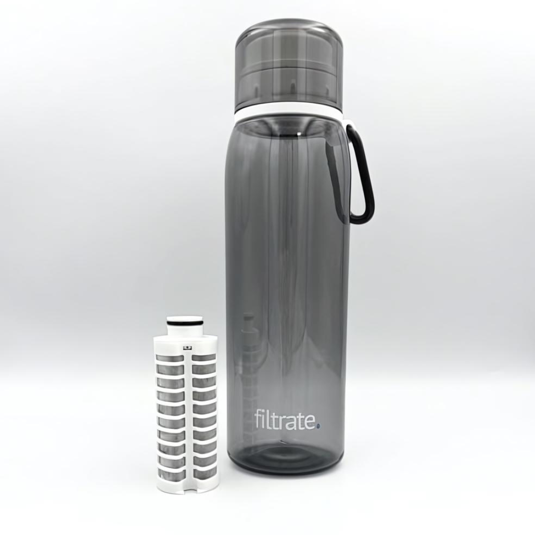 Filter water bottle next to its removable alkaline filter.